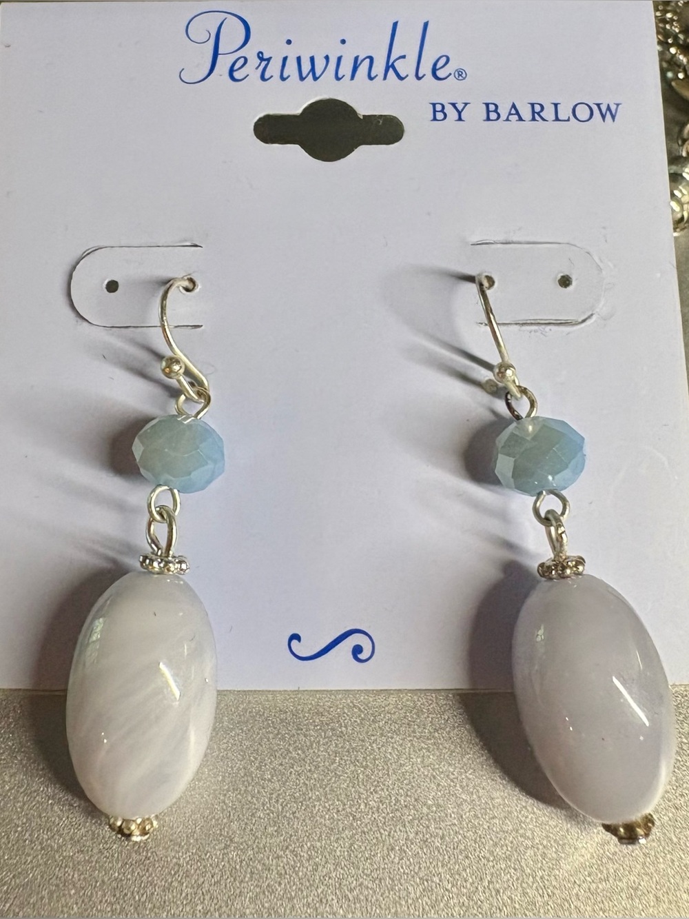Periwinkle dangle earrings: blue and gray beads with silver hardware.